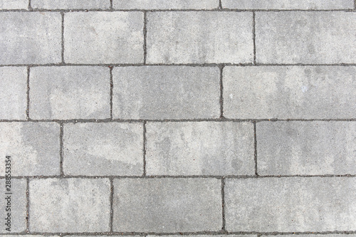 gray rectangular stone of modern paving slabs, background, texture