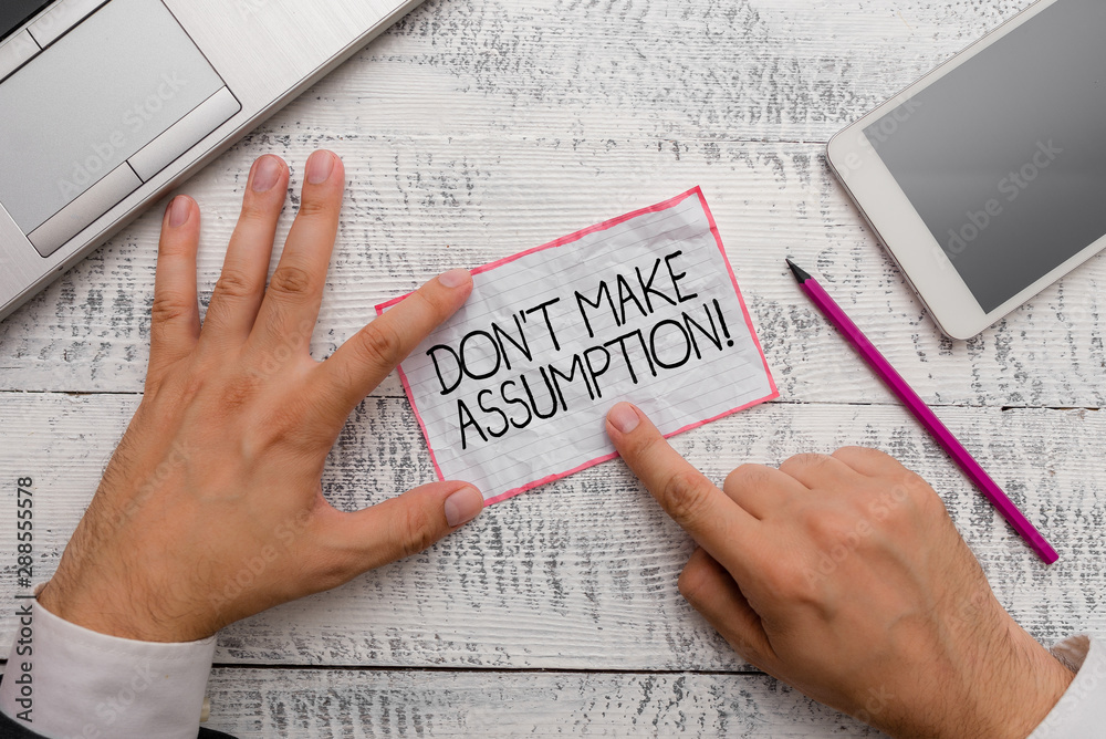 Φωτογραφία Conceptual hand writing showing Don T Make Assumption