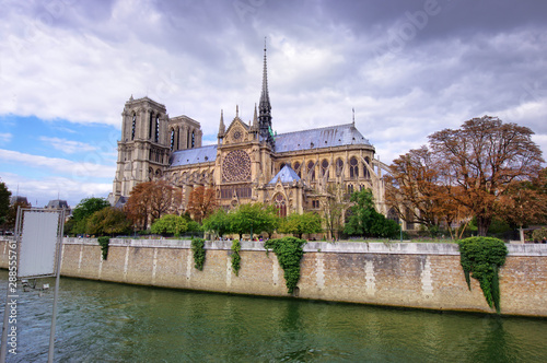 Notre Dame cathedral in Paris, France. dark clouds