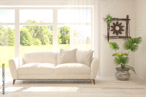 Stylish room in white color with sofa and summer landscape in window. Scandinavian interior design. 3D illustration