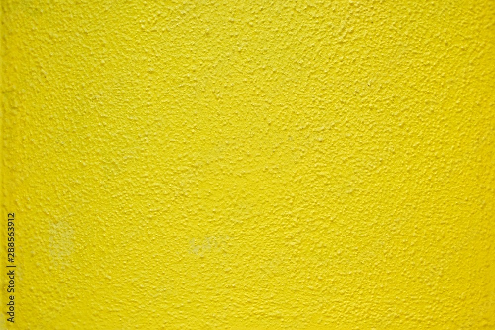 Bold vibrant yellow textured surface. Bold vibrant yellow textured surface.