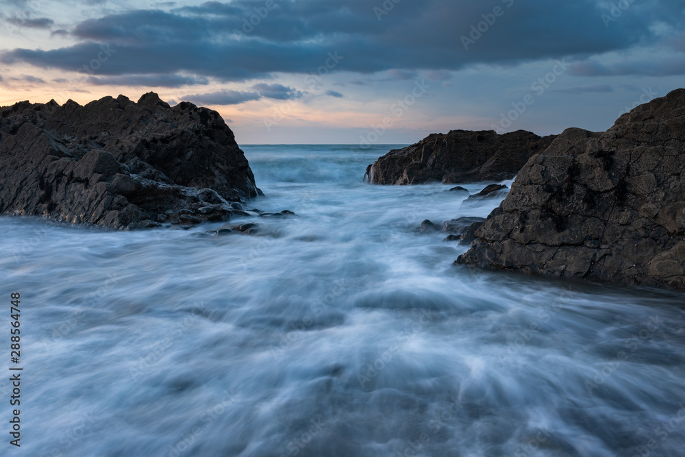 Westward Ho, Devon seascape with waves with motion in the water