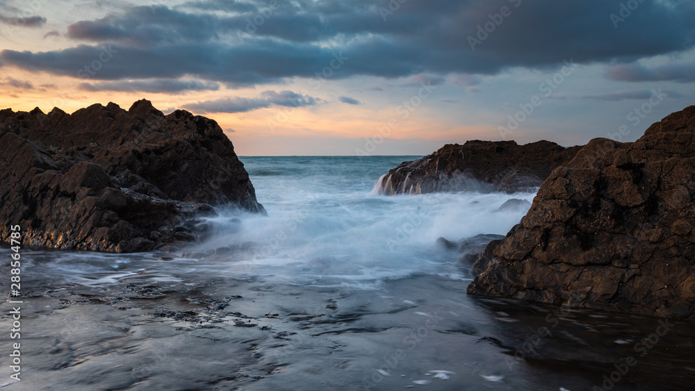 Westward Ho, Devon seascape with waves with motion in the water Westward Ho, Devon seascape with waves with motion in the water