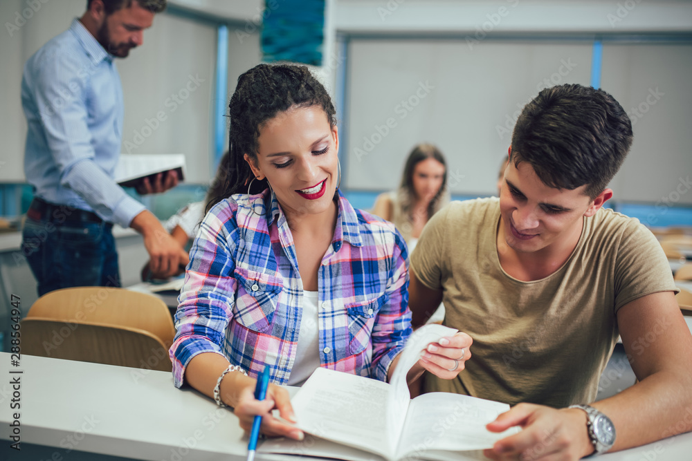 Smart young people study at the college in the classroom. Smart young people study at the college in the classroom.