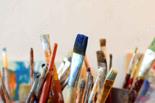 Paint brushes with different colors, closeup