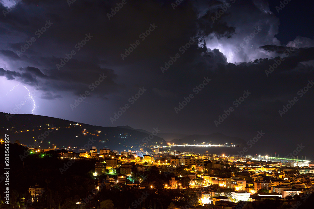 Lightning and thunderstorm on the Tigullio Gulf - Ligurian sea - Chiavari - Italy.
