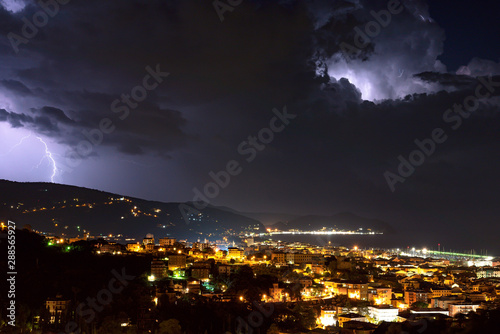 Lightning and thunderstorm on the Tigullio Gulf - Ligurian sea - Chiavari - Italy. © claudio968
