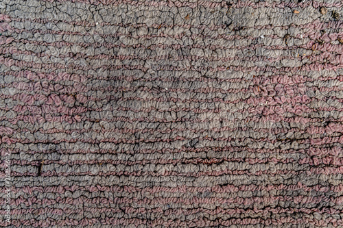 Old dirty carpet texture. Pink horizontal lines. Background