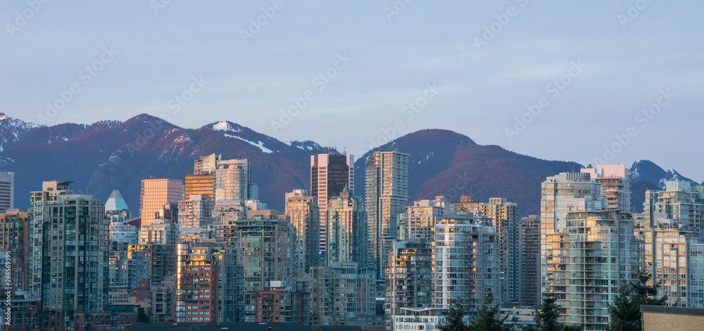 panorama view over skyline Vancouver downtown with the mountains of north Vancouver in the background