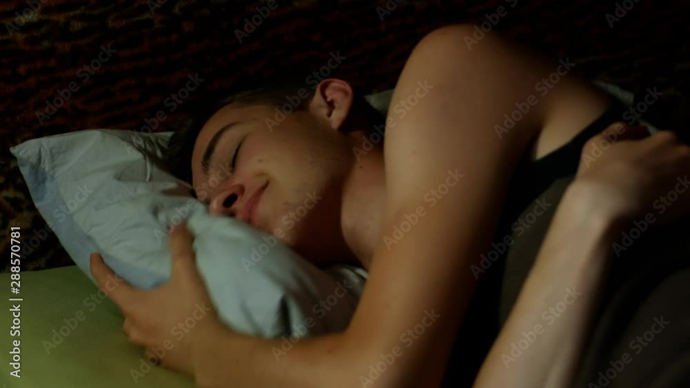Calm young woman sleeping well in comfort Calm young woman sleeping well in comfort