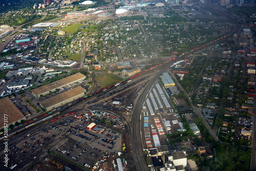 Calgary,Canada-September 2, 2109: Aerial view of long freight train running in Inglewood, Calgary, Canada photo