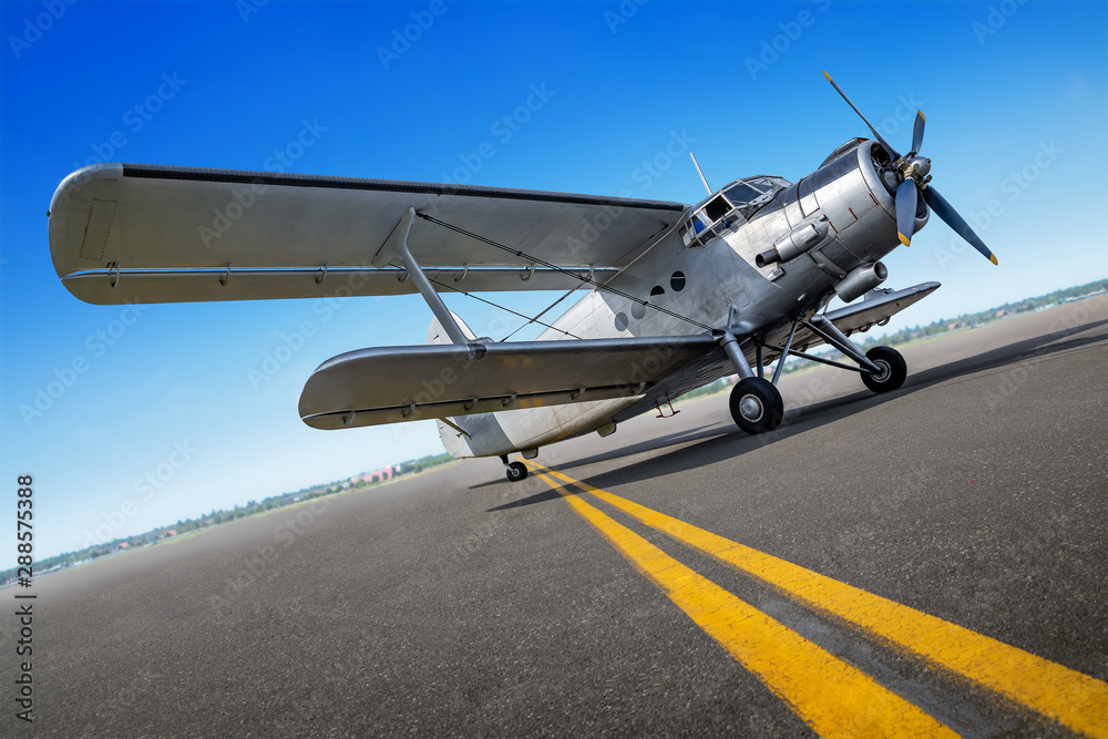Fototapeta premium historical airplane on a runway