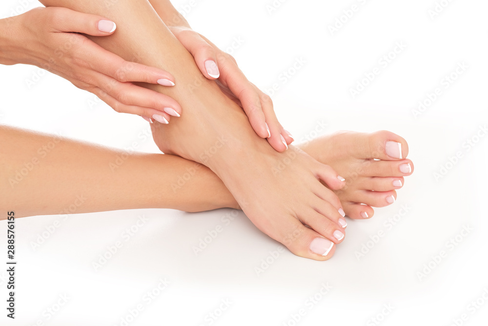 Studio shoot. Close up of perfectly done pedicure and manicure. Healthy and fresh skin is important for woman. Studio shoot. Close up of perfectly done pedicure and manicure. Healthy and fresh skin is important for woman.