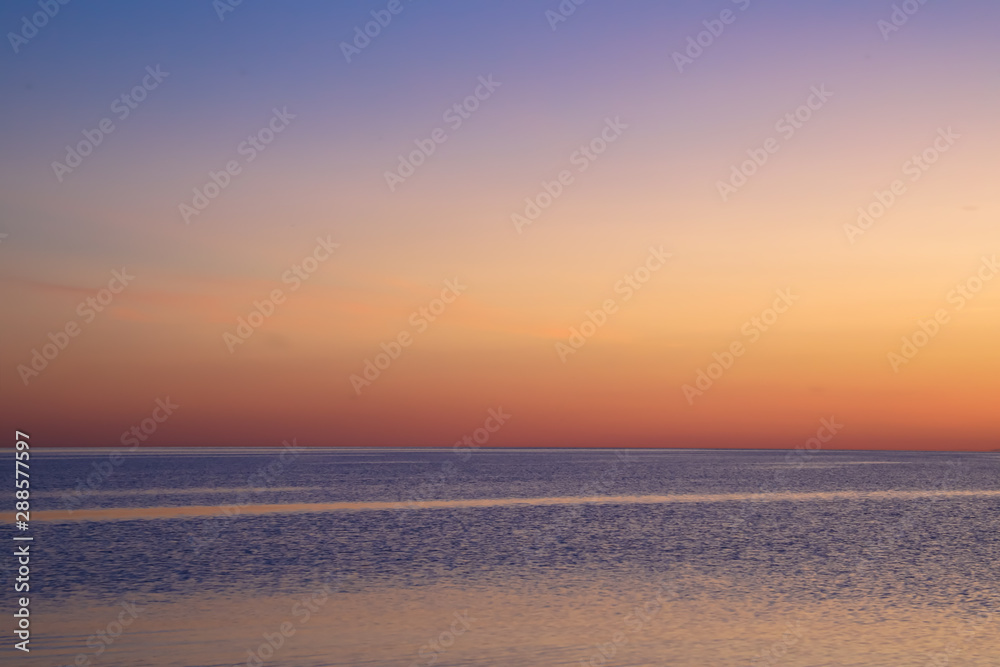 landscape in blue and pink colors - beautiful calm sunset
