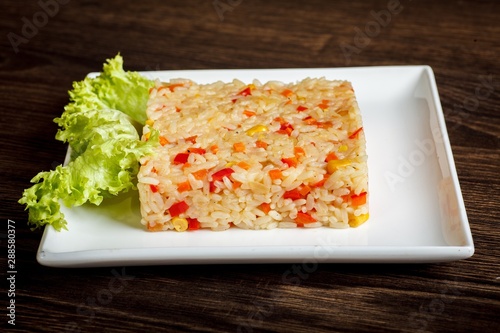 Vegetable rice, veg biryani, cooked rice and gabbage. Vegetarian classical Mexican, Thai cuisine.