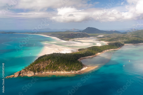 Aerial shot of Hill Inlet over Whitsunday Island - swirling white sands, sail boats and blue green water