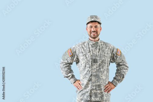 Soldier in camouflage on co...