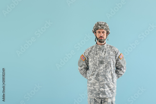 Soldier in camouflage on co...