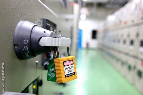 Lockout Tagout , Electrical safety system.Key lock switch or circuit breaker for safety protect.in electric room photo