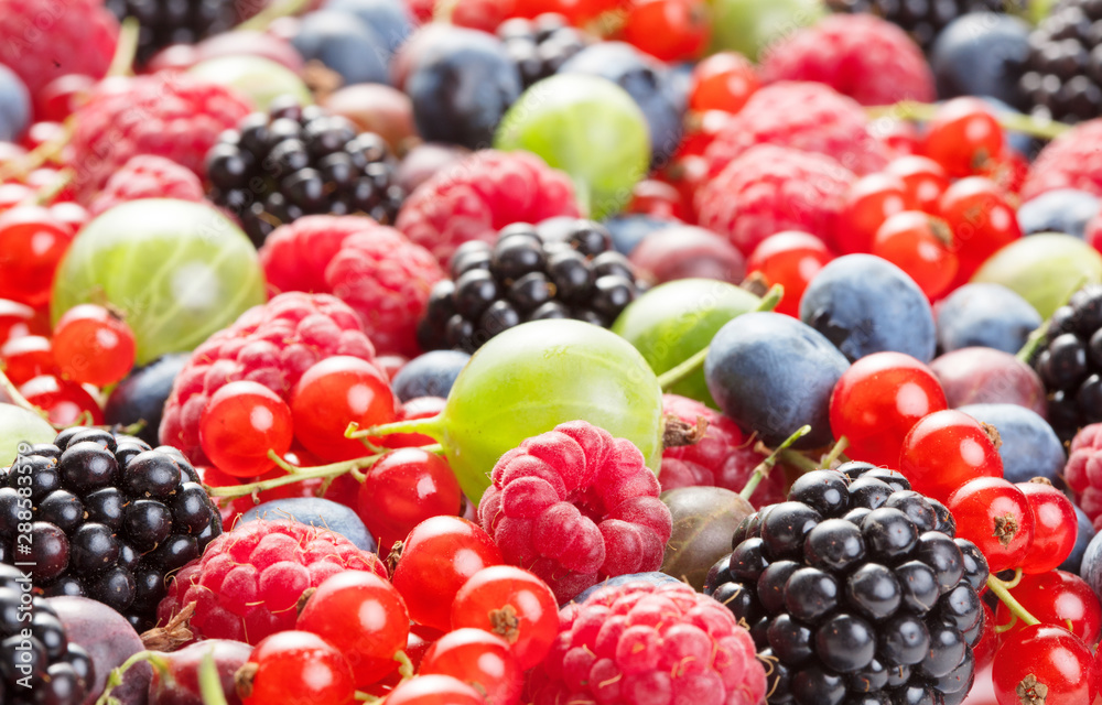 fresh fruits and berries as textured background fresh fruits and berries as textured background