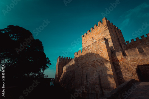 Medieval castle tower, view from below photo