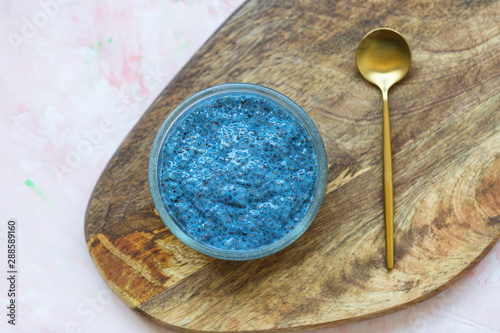 Blue spirulina chia seed pudding bowl. Superfood and vegan concept.