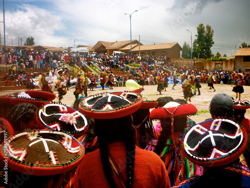 Chinchero, Cusco, Peru - Jan 10, 2010: Crowds gather to watch traditional Quechua dances in the Peruvian Andes photo