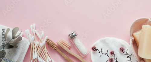Fotografie Bamboo earbuds, toothbrushes, natural floss, cotton makeup removal pads, shampoo