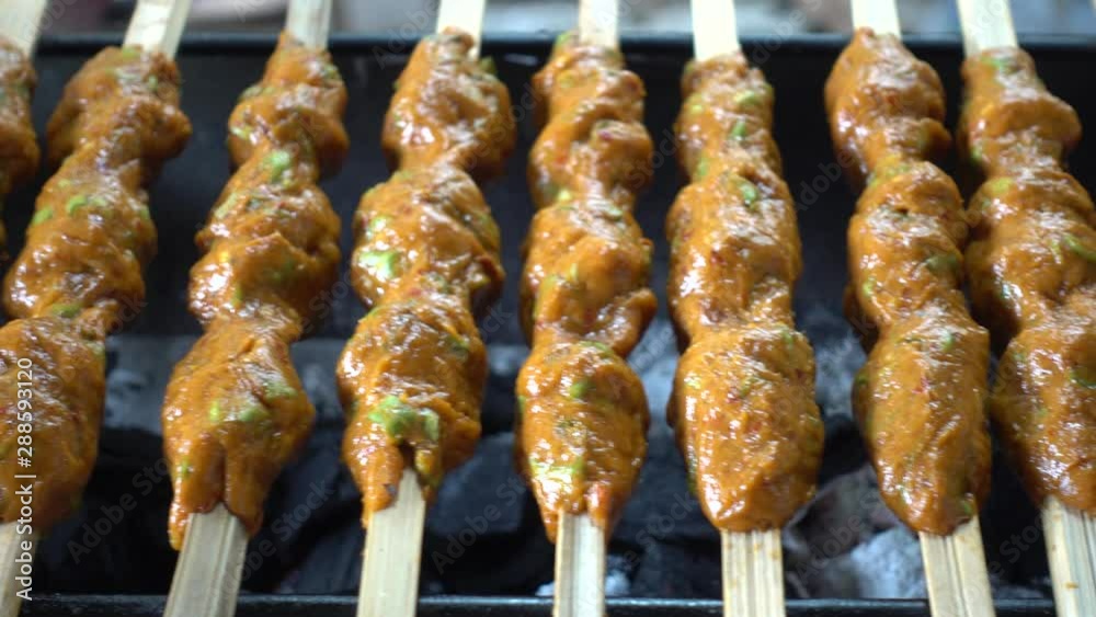 Authentic Thai street food made by fish and curry grilled . Authentic Thai street food made by fish and curry grilled .