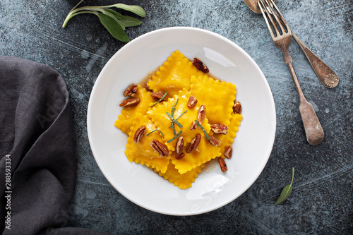 Butternut squash tortellini with brown butter and pecans photo