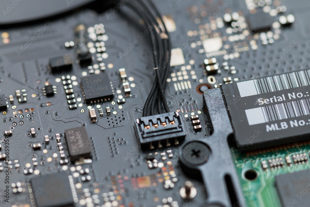 The interior of a computer being fixed. The interior of a computer being fixed.
