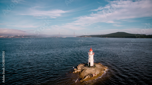 Aerial photo of marine landscape with views of the landmark lighthouse Tokarevskiy. photo