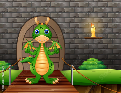 A dragon showing thumb up and standing on suspension bridge