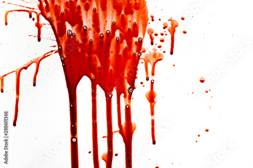 Blood dripping down on white background.