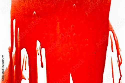 Blood dripping down on white background.