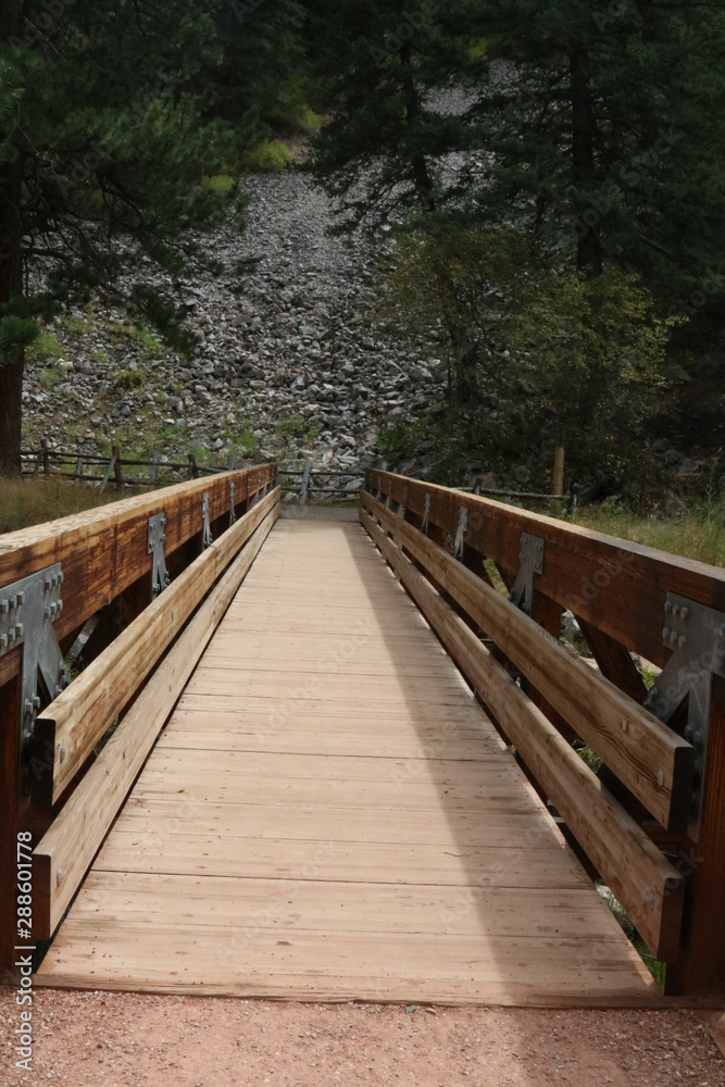 Looking across wooden bridge, centered