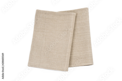 isolated on white background kitchen tablecloths folded napkins for the table. Natural cloth. Gray and beige color. Top view.