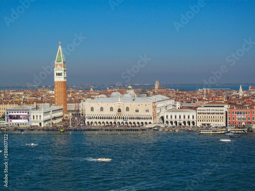 Grand Canal in Venice, Italy. Scenic panoramic view on Venetian landmarks - water surface and seafront with buildings and architecture attractions. 