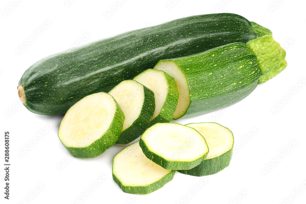 fresh green zucchini with slices isolated on white background fresh green zucchini with slices isolated on white background