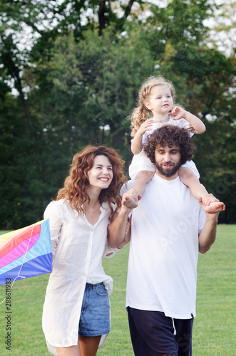 Happy young family in the park