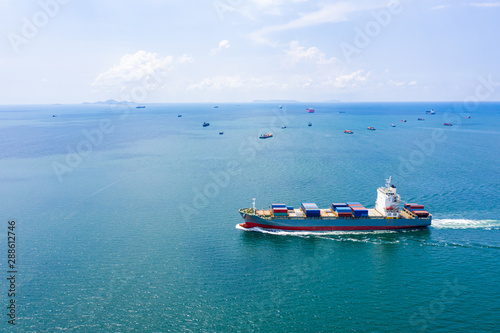 shipping cargo logistics containers international open sea © SHUTTER DIN
