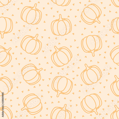 Seamless pattern with pumpkins and hearts