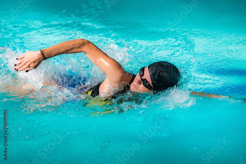 Recreational Front Crawl Swimming in The Pool.