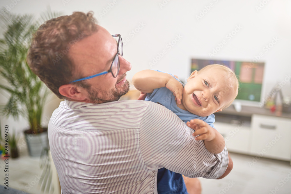 Single dad going nuts at home with a baby. Single dad going nuts at home with a baby.