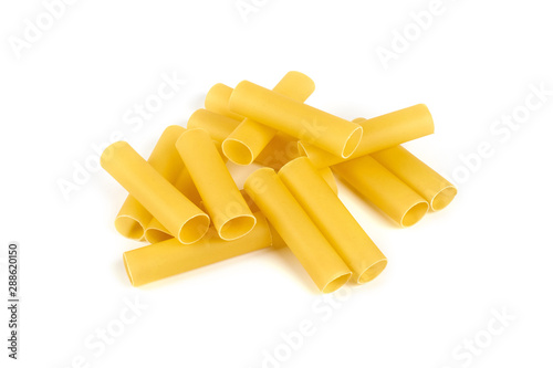 Italian cannelloni pasta tubes isolated over white background.