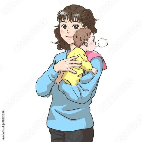 Fotografie A young mother burping a baby