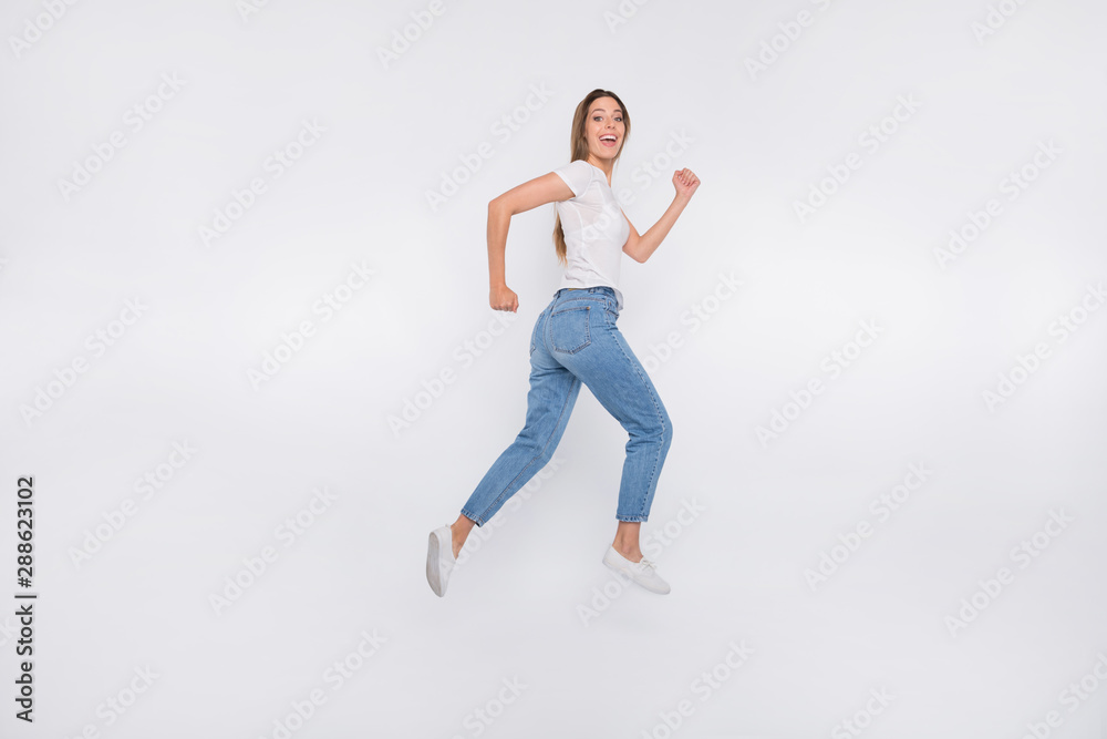 Full length body size photo of attractive nice cute girl running away from camera while isolated with white background Full length body size photo of attractive nice cute girl running away from camera while isolated with white background