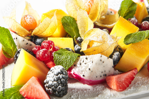 Exotic Fruit Plate or Vegan Platter with Sliced Fruits and Berries