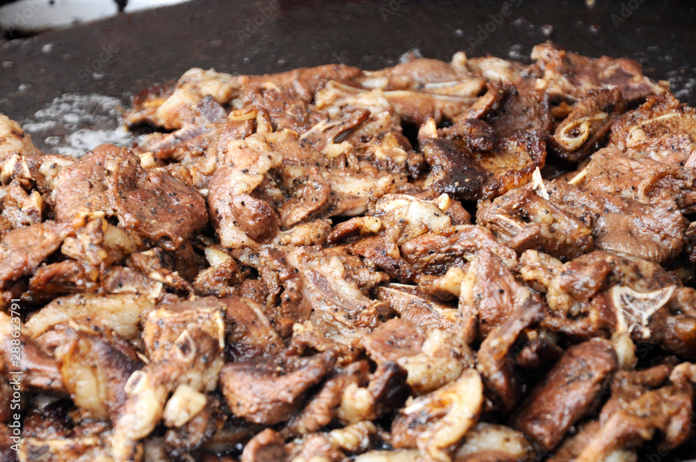 Selective focused of lamb grill at the Malaysia’s hawkers market. The meat was marinated with special spices before grill to get its special taste. Selective focused of lamb grill at the Malaysia’s hawkers market. The meat was marinated with special spices before grill to get its special taste.