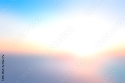 Hope concept: Bokeh light and abstract blurry blue sky and clouds mountain sunrise background photo